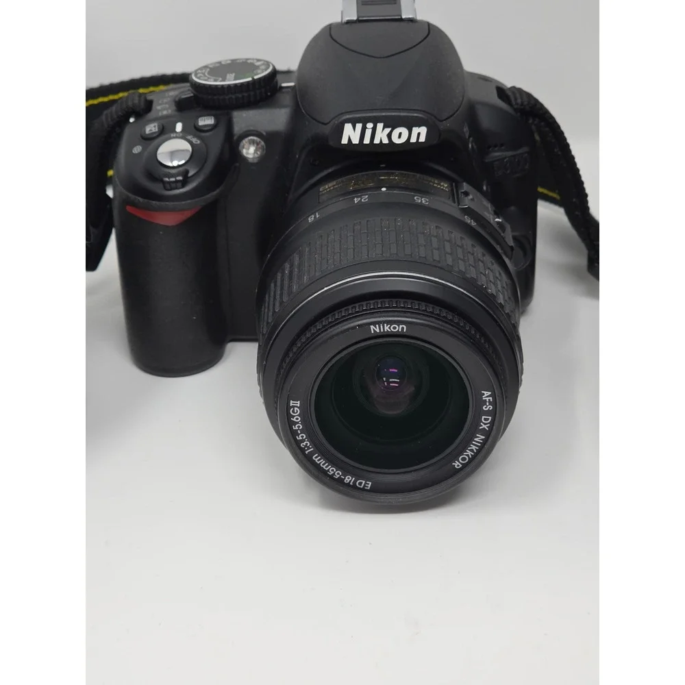 Nikon D3100 DSLR Camera Bundle 18-55mm 35mm 70-300mm Lenses Case Charger